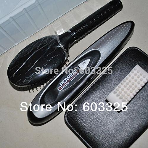 Velform Power Grow Laser Hair Comb, a standard hair brush, and a small cleaning brush on a black surface
