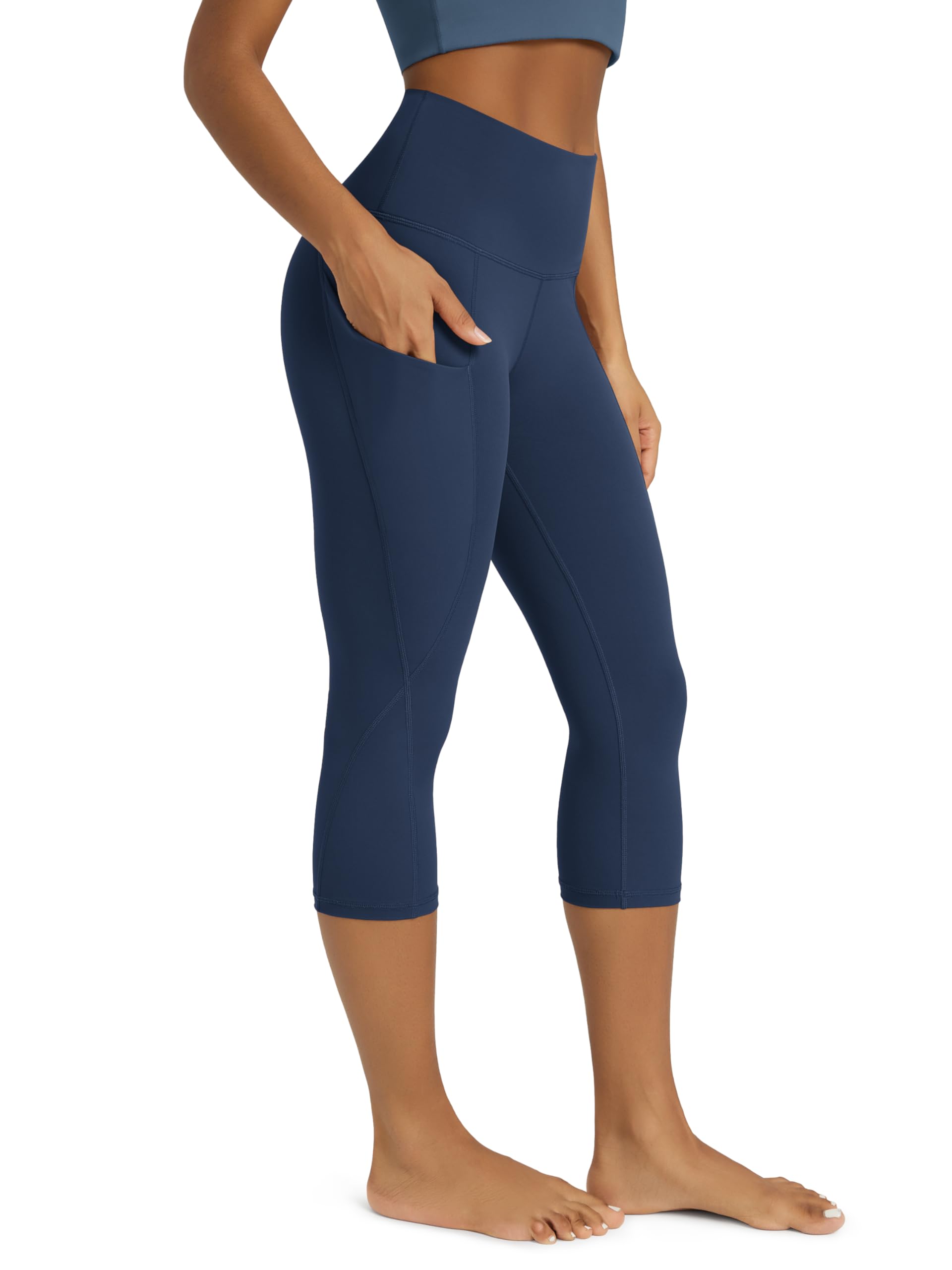 ODODOS Women's High Waisted Yoga Capris with Pockets, Tummy Control Non See Through Workout Athletic Running Capri Leggings