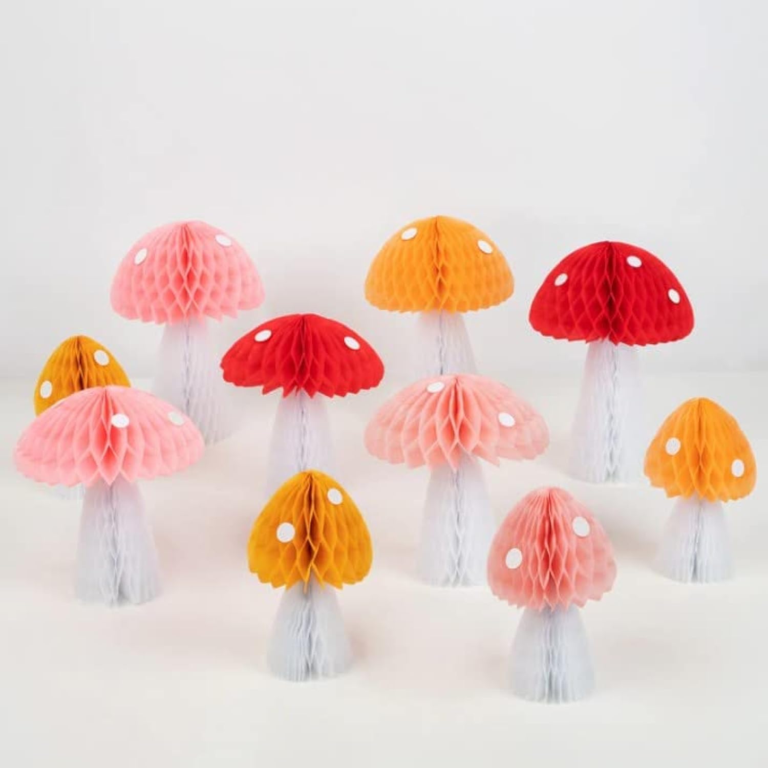 Honeycomb Mushroom Decorations – Create a whimsical woodland with these 3D honeycomb mushrooms in red, pink, peach, yellow, and white. Simple self-assembly, pack of 10.