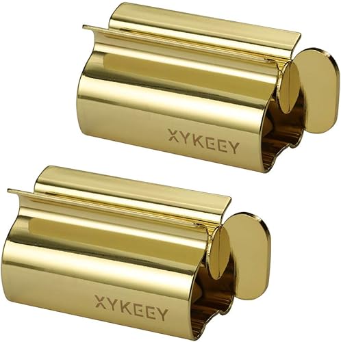 XYKEEY Exprimidor de tubo de pasta de dientes, juego de 2 rodillos exprimidores de pasta de dientes, soporte de asiento de tubo de pasta de dientes