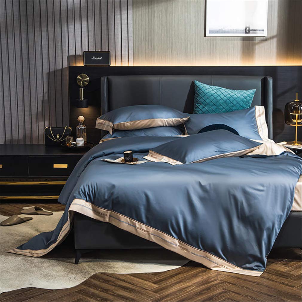 Ensemble housse de couette en coton contre les draps froissés