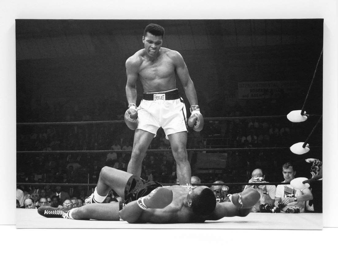 LIENZO VINTAGE MOHAMED ALI . Impreso en canvas de algodón de 320 gr. . Montado sobre bastidor de madera de pino de 2 cm de grosor. Acabado Mate. Muy Ligero y resistente. 2 Tamaños a elegir. (50x75cm)