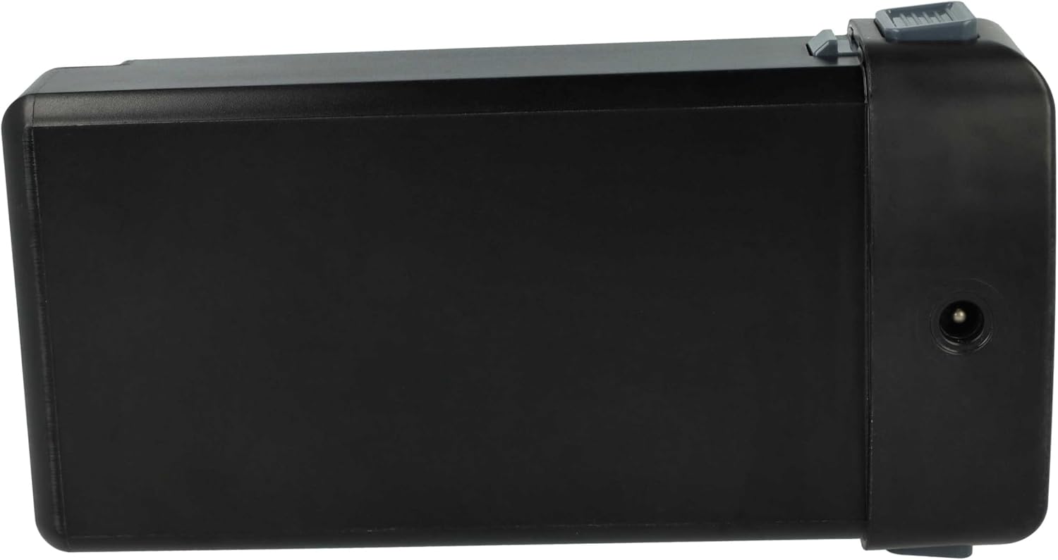 Side view of the vhbw battery showing the charging port.