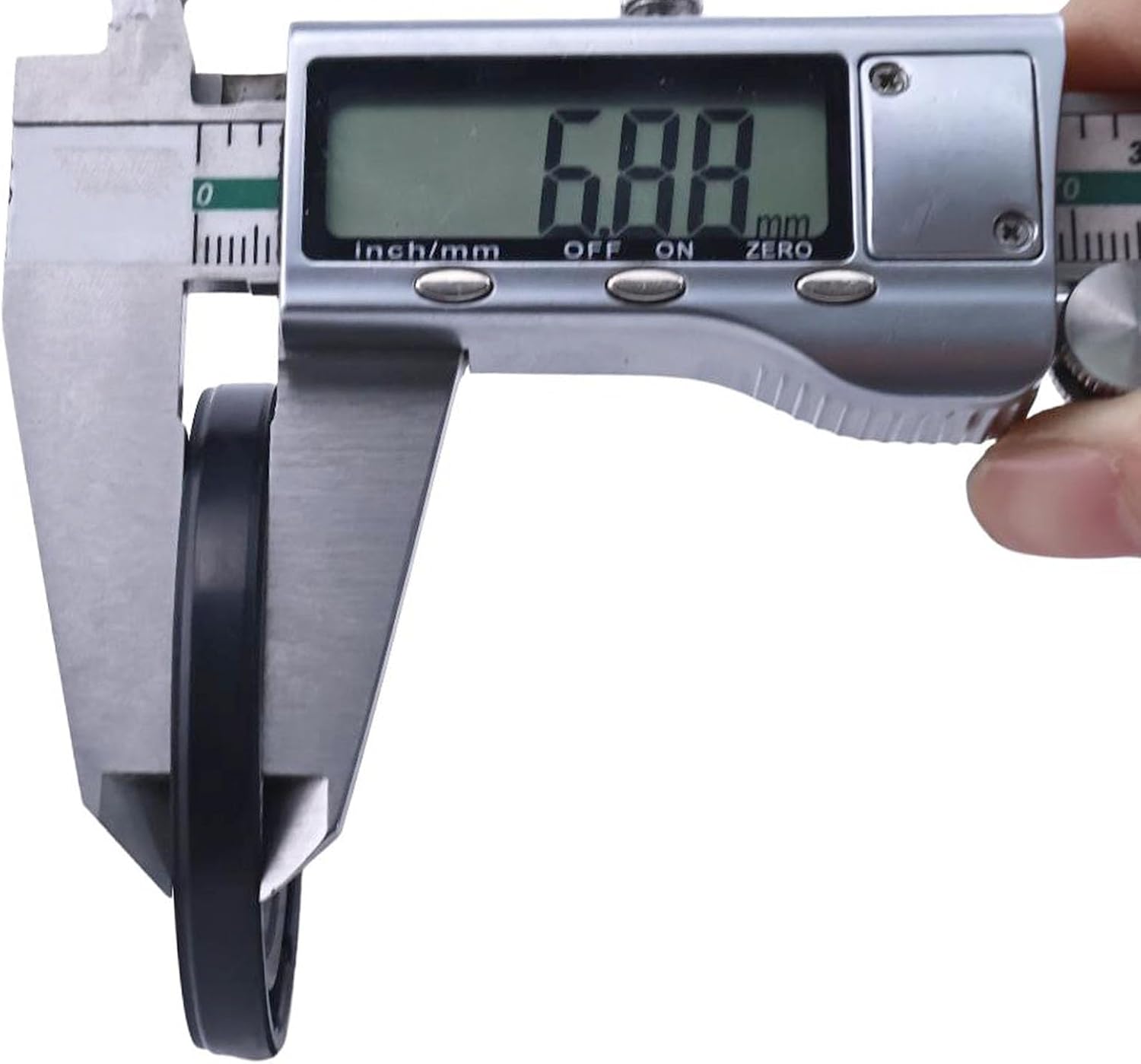 Timing cover seal with caliper measuring inner diameter
