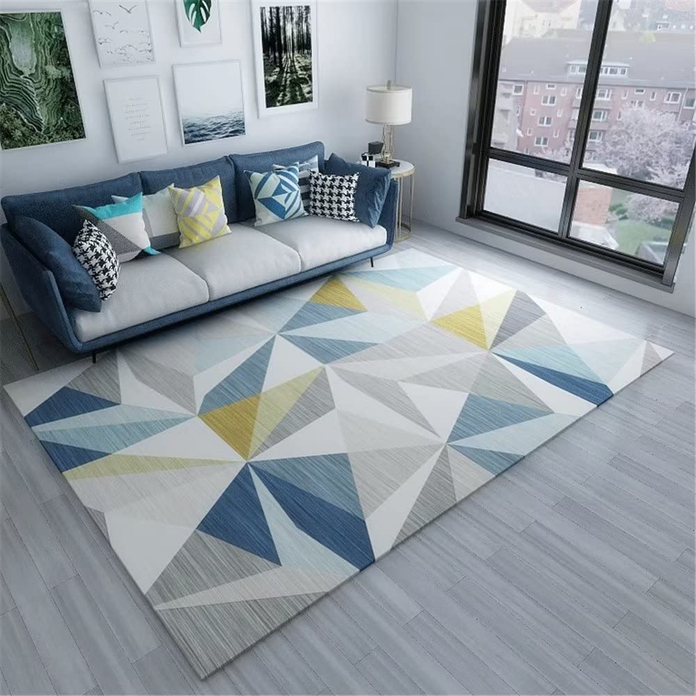 Tapis bleu de salon au motif triangle dense pour réveiller votre déco
