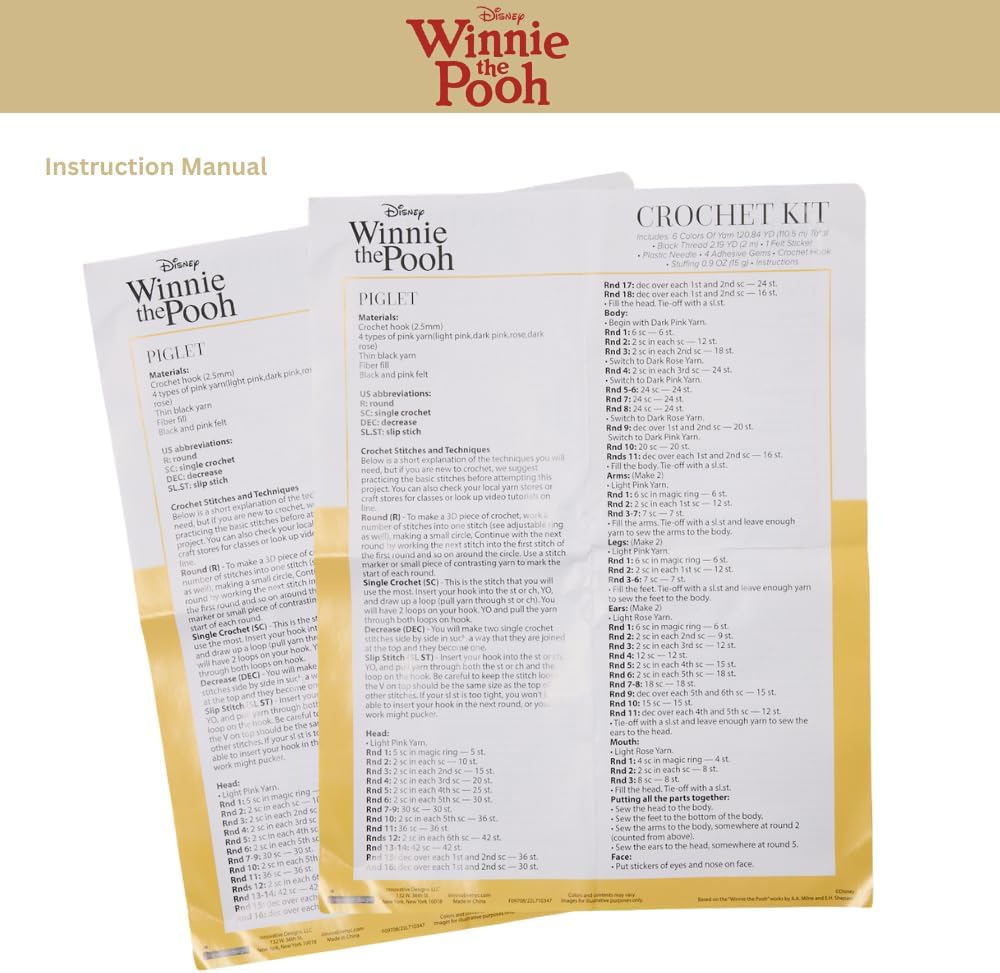 Close-up of the crochet kit's instruction manual pages showing patterns for Pooh and Piglet.