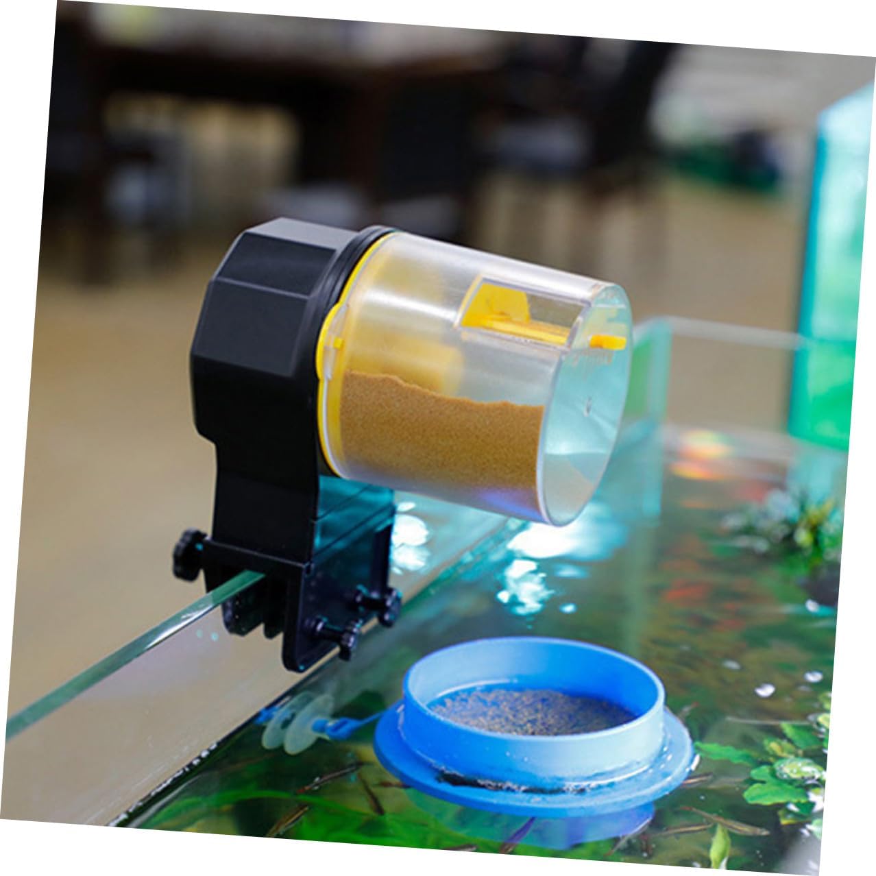 Automatic Fish Feeder for Aquarium and Goldfish, Adjustable Timer Feeding Machine, Small Tank Vacation Fish Food Dispenser in Yellow Without Batteries