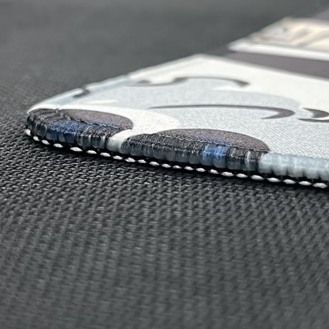 Close-up of the anti-fray stitched edges of the mouse pad