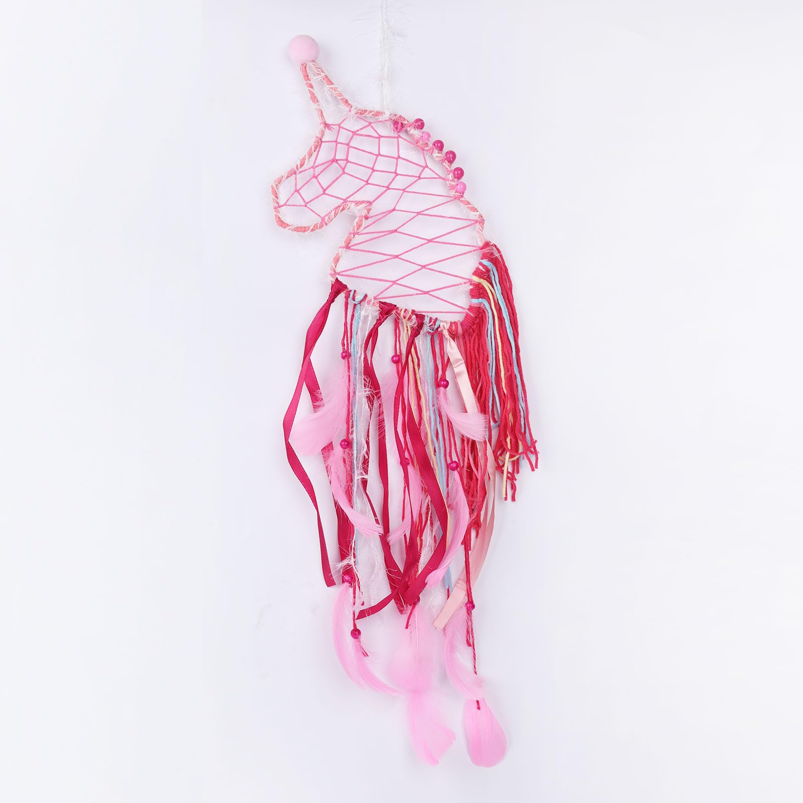 Attrape-rêves licorne fait main aux pompons moelleux pour apaiser le sommeil de votre petite fille