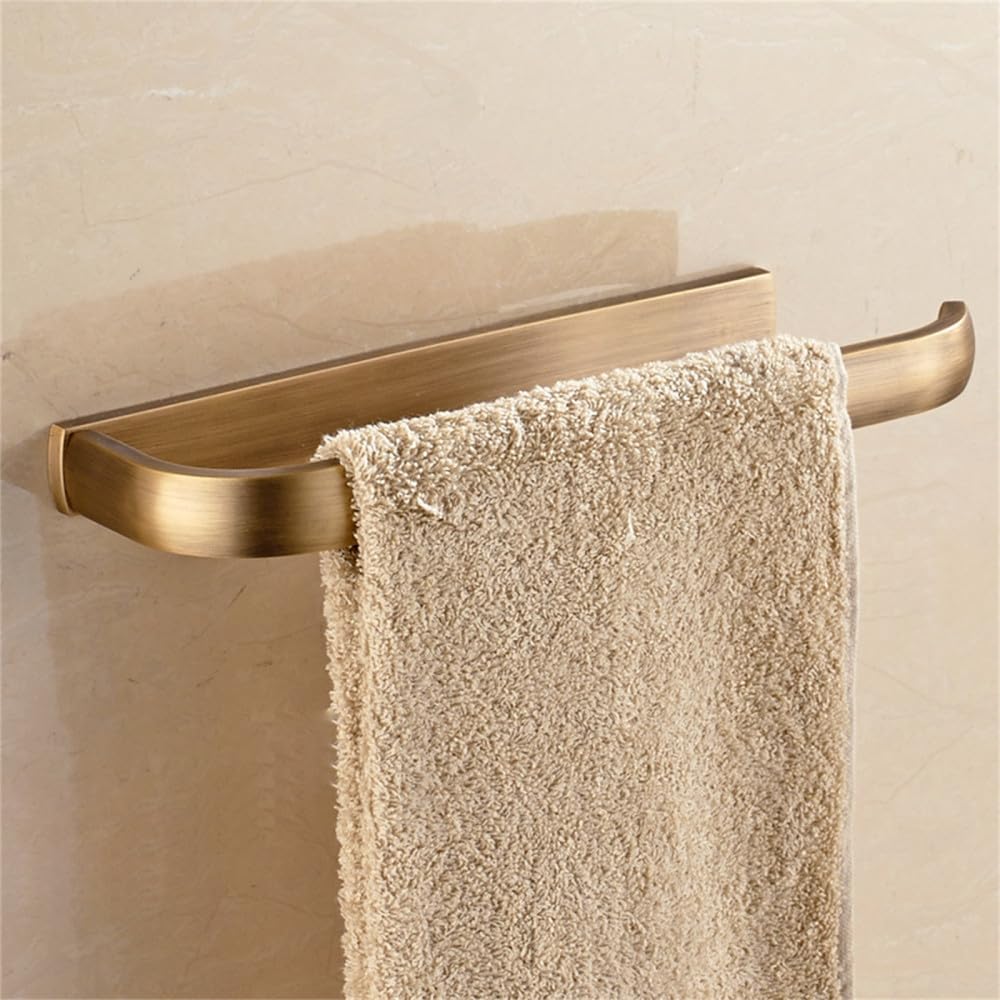 Porte-serviettes en bronze antique et accessoires pour créer une ambiance spa à la maison