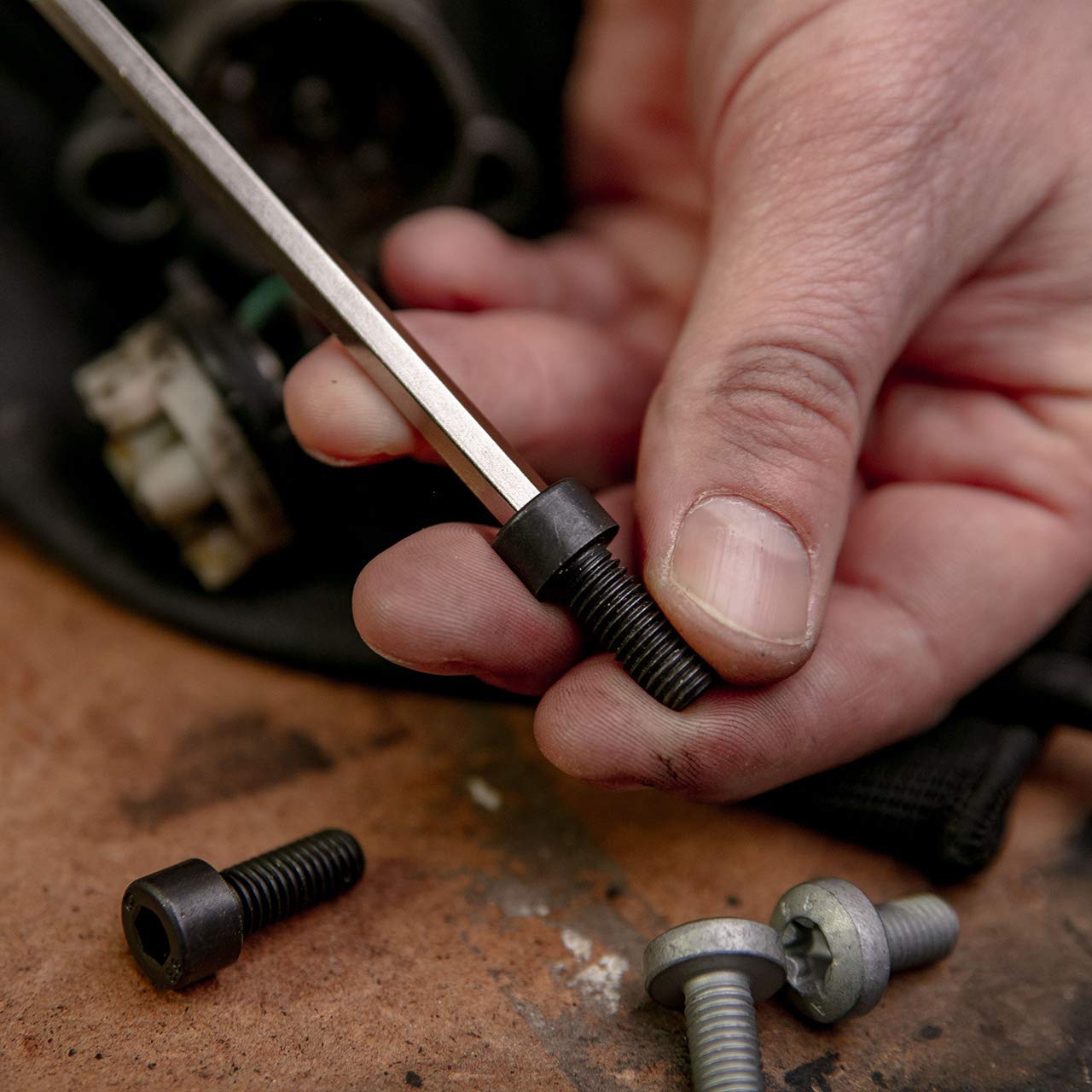 Set of hexagonal Allen wrench keys with a cross handle. - 7