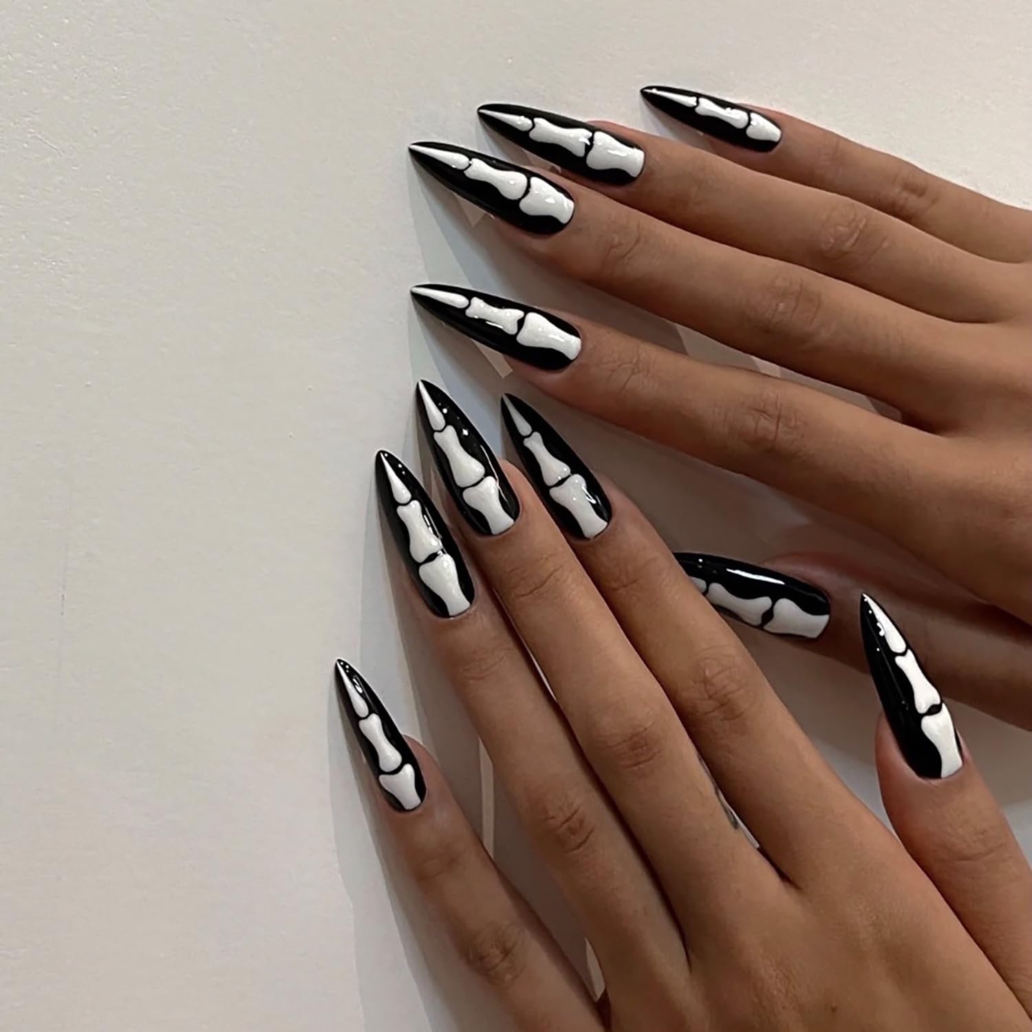 24 Pcs Almond Press on Nails Long Stiletto Fake Nails with Glue Black White Full Cover False Nails with Skeleton Palm Design Acrylic Nails Press ons