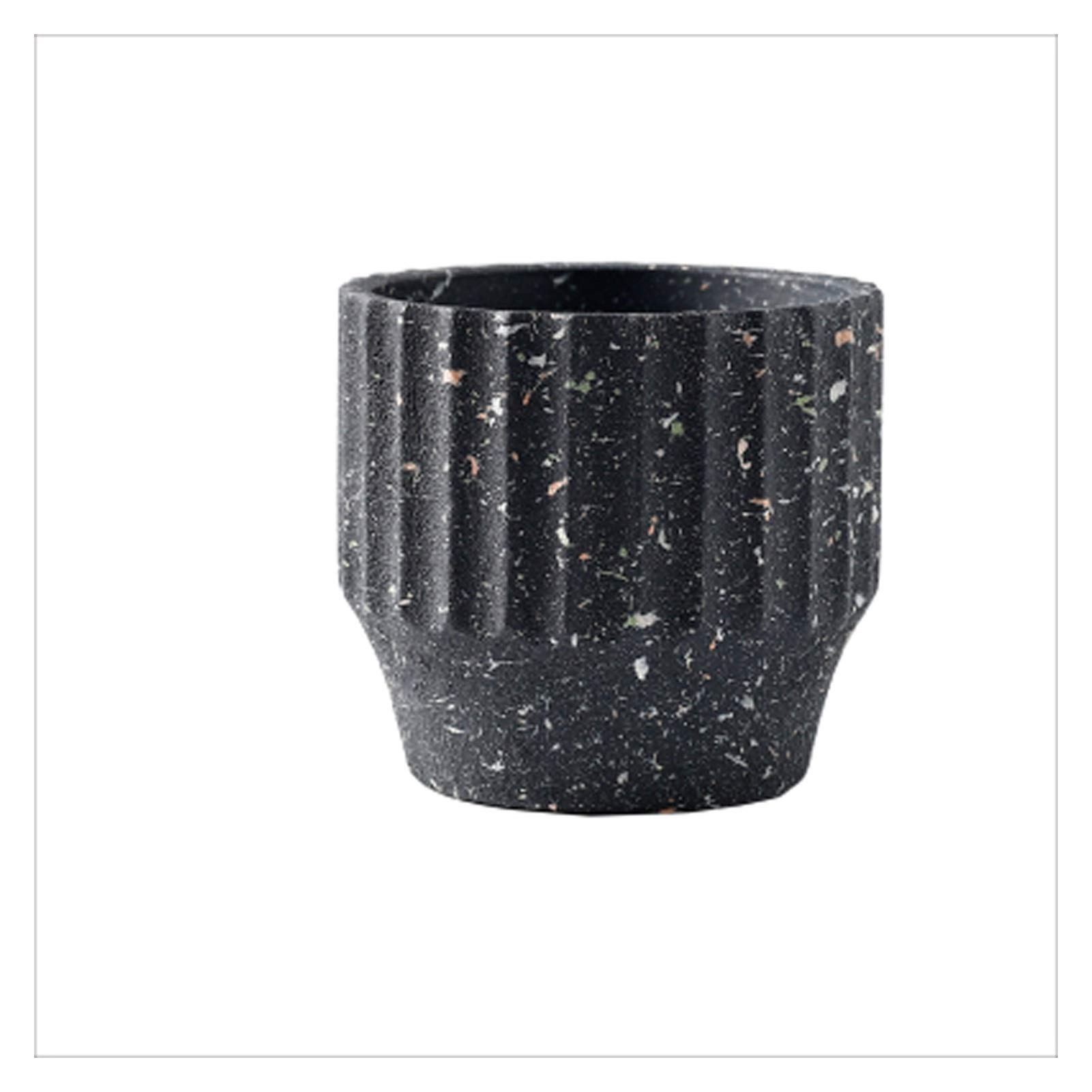 Pots de fleurs en ciment avec trou de drainage pour éviter de noyer vos plantes