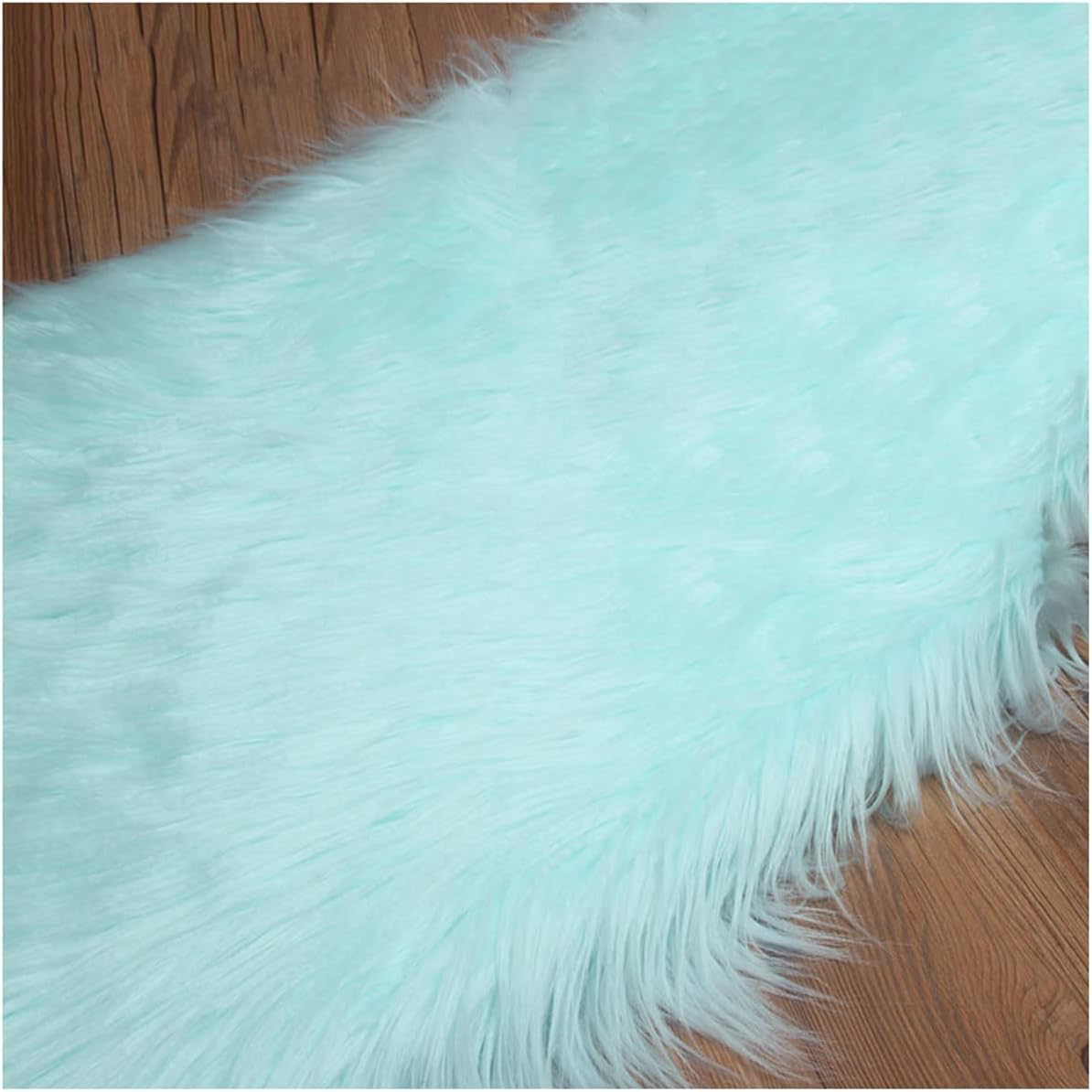 Fausse fourrure poil long vert menthe pour décoration chalet et loisirs