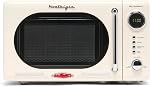 Nostalgia 0.7 Cu. Ft. Retro Compact Countertop Four à micro-ondes, Ivoire