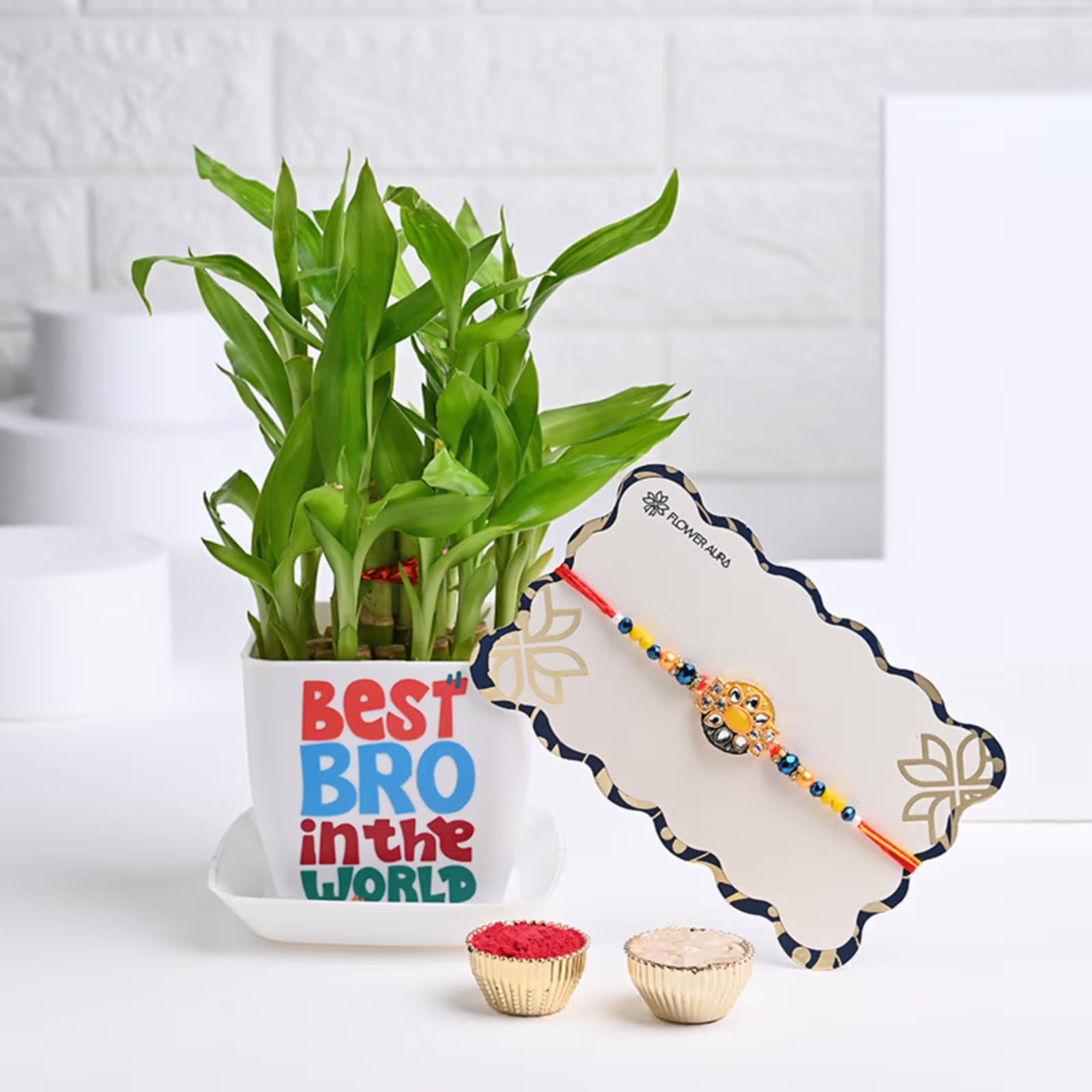 FlowerAura Raksha Bandhan Celebrations Sparkling Meenakari Rakhi With Bro Theme 2 Layer Lucky Bamboo Plant - Gift for Brother, Bhai, Cousins & Raksha Bandhan Gift (Same Day Delivery) (B0DCBY3PXX) Amazon Price History, Amazon Price Tracker
