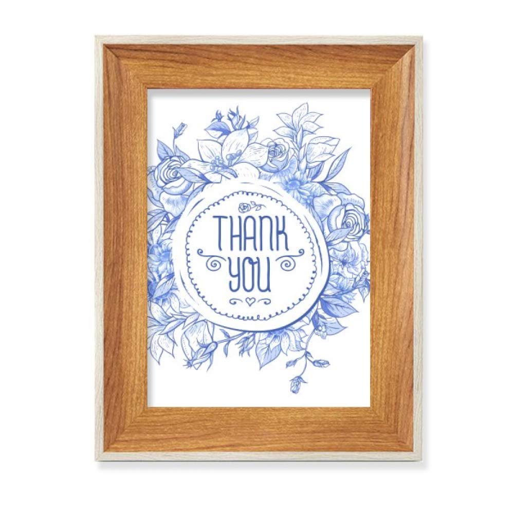 Cadre photo en bois fleurs bleues pour une déco de salon nature