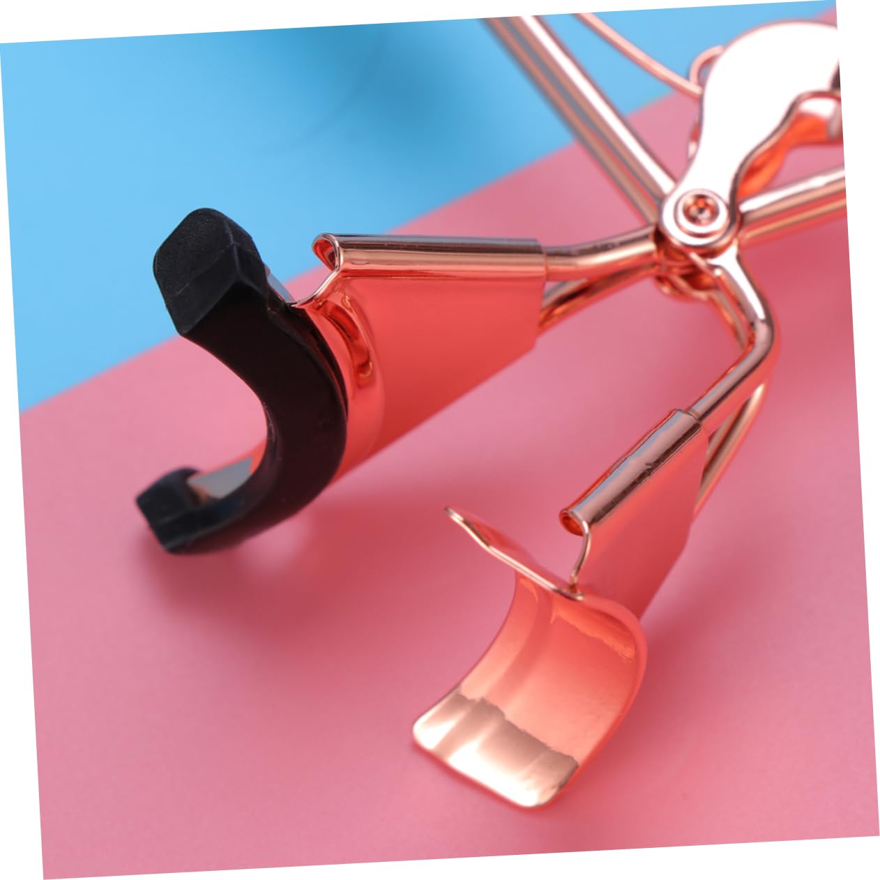 Ipetboom Eyelash Curler Tool with Rubber Pad Rose Gold Makeup Curler for Stunning Eye Looks Portable Beauty Tool for Effortless Lash Curling and Charm Enhancement