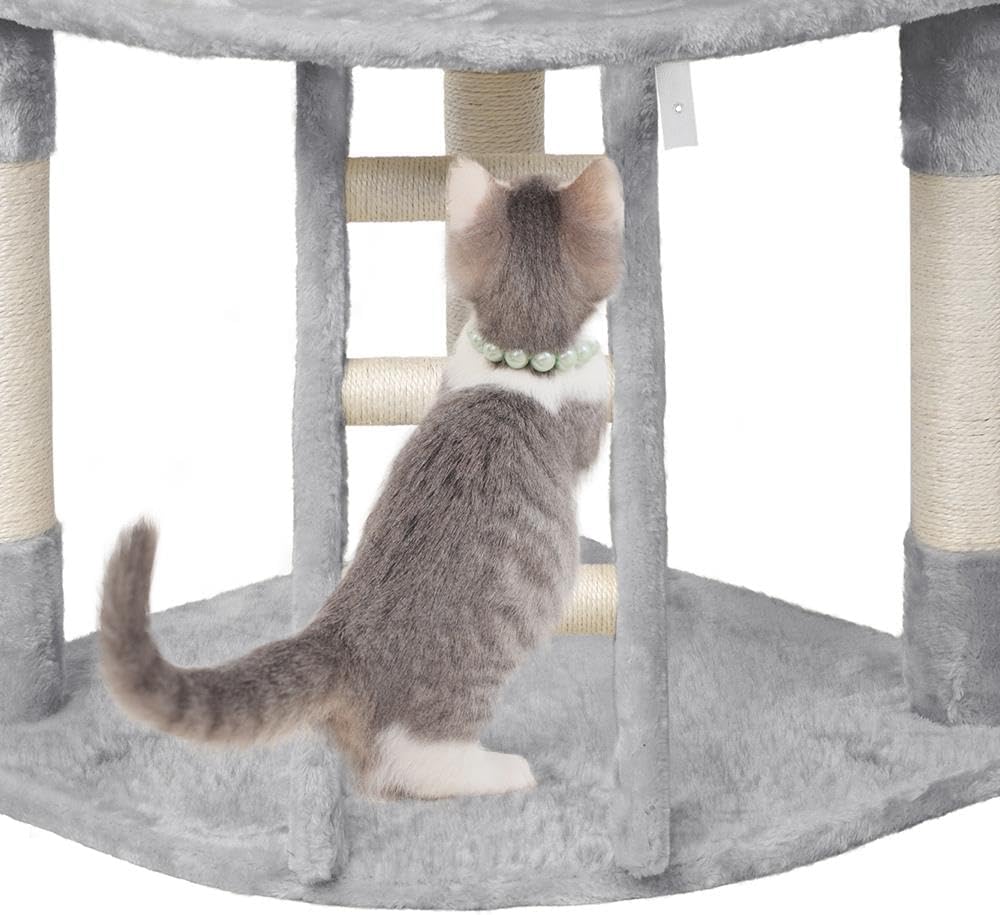 A cat actively scratching one of the sisal-wrapped posts on the Yaheetech cat tree.