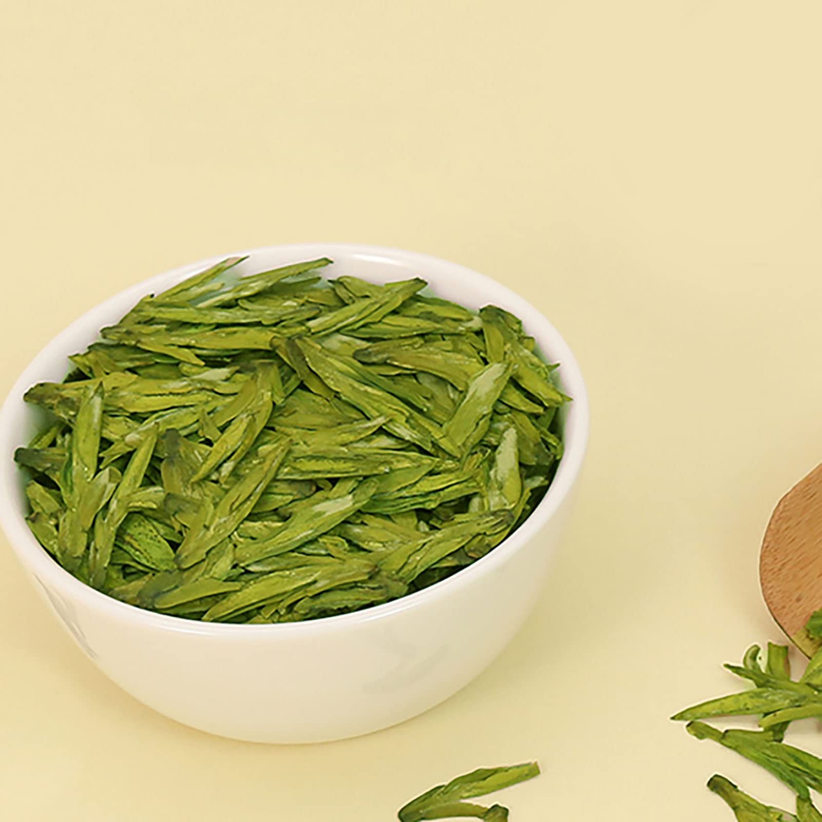 Longjing Tee, Chinesischer Drachenbrunnen-Grüntee Loseblätter LongJing-Grüntee 80 G Nettoinhalt Drachenbrunnen-Grünteeblätter, die vor Dem Getreideregentag Gepflückt Werden