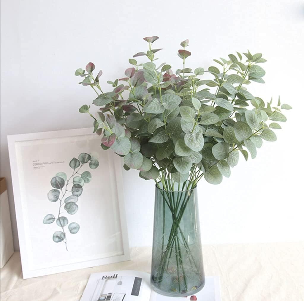 花瓶で造花を飾るガラスラップクロスで作られた花瓶偽の花