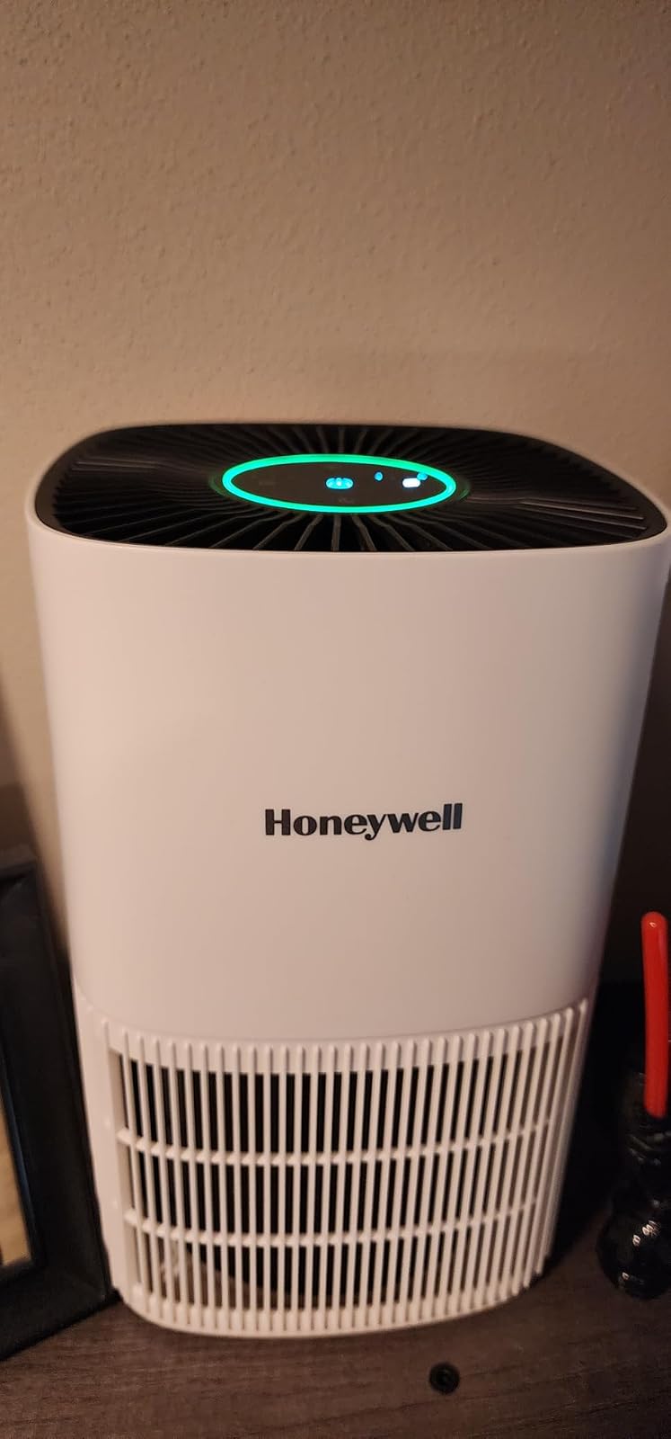 Honeywell AllergenPlus HPA125 in white color on office desk showing compact size