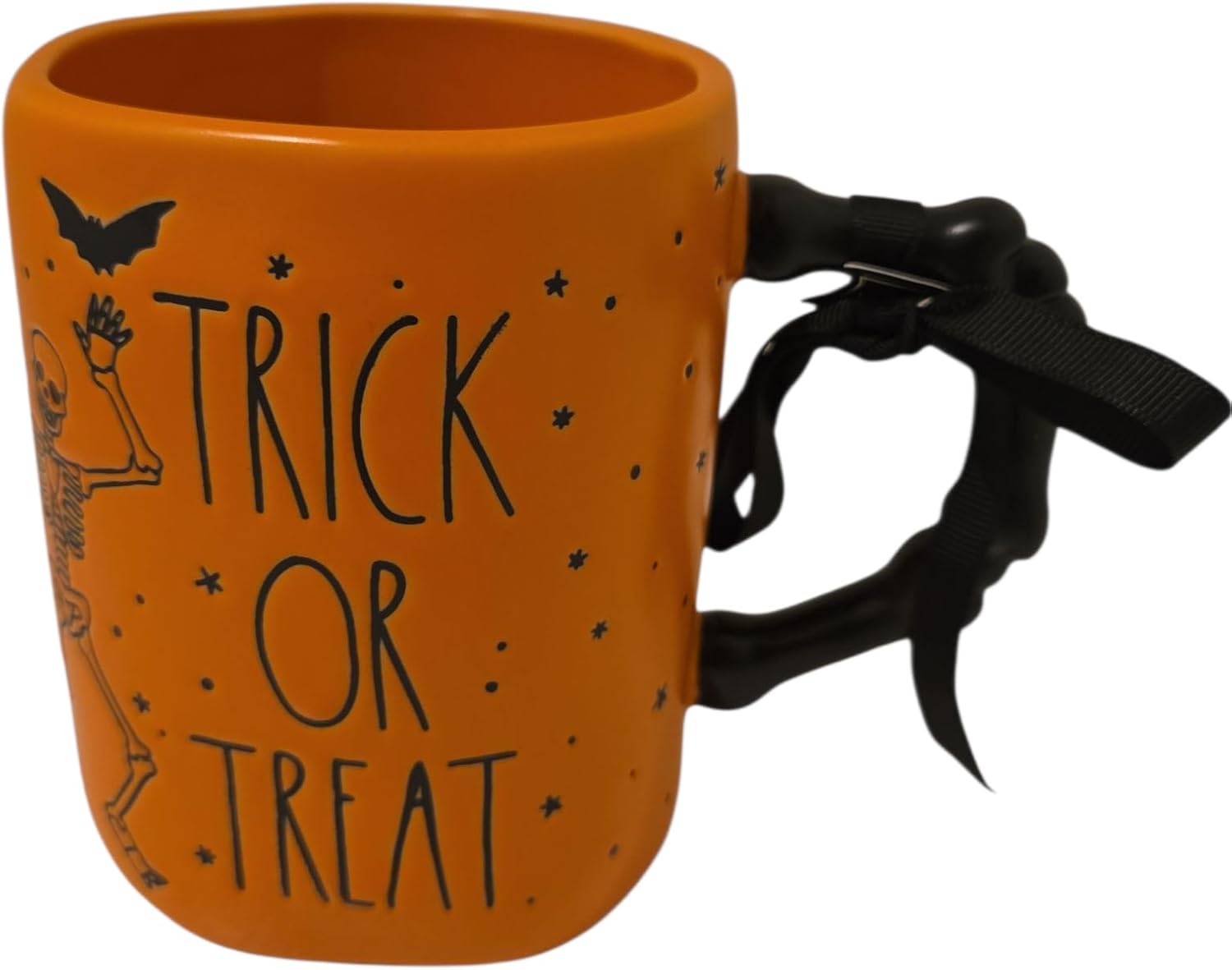 Rae Dunn Trick or treat Halloween Ceramic coffee mug with Dancing skeleton and bat detail. Orange mug