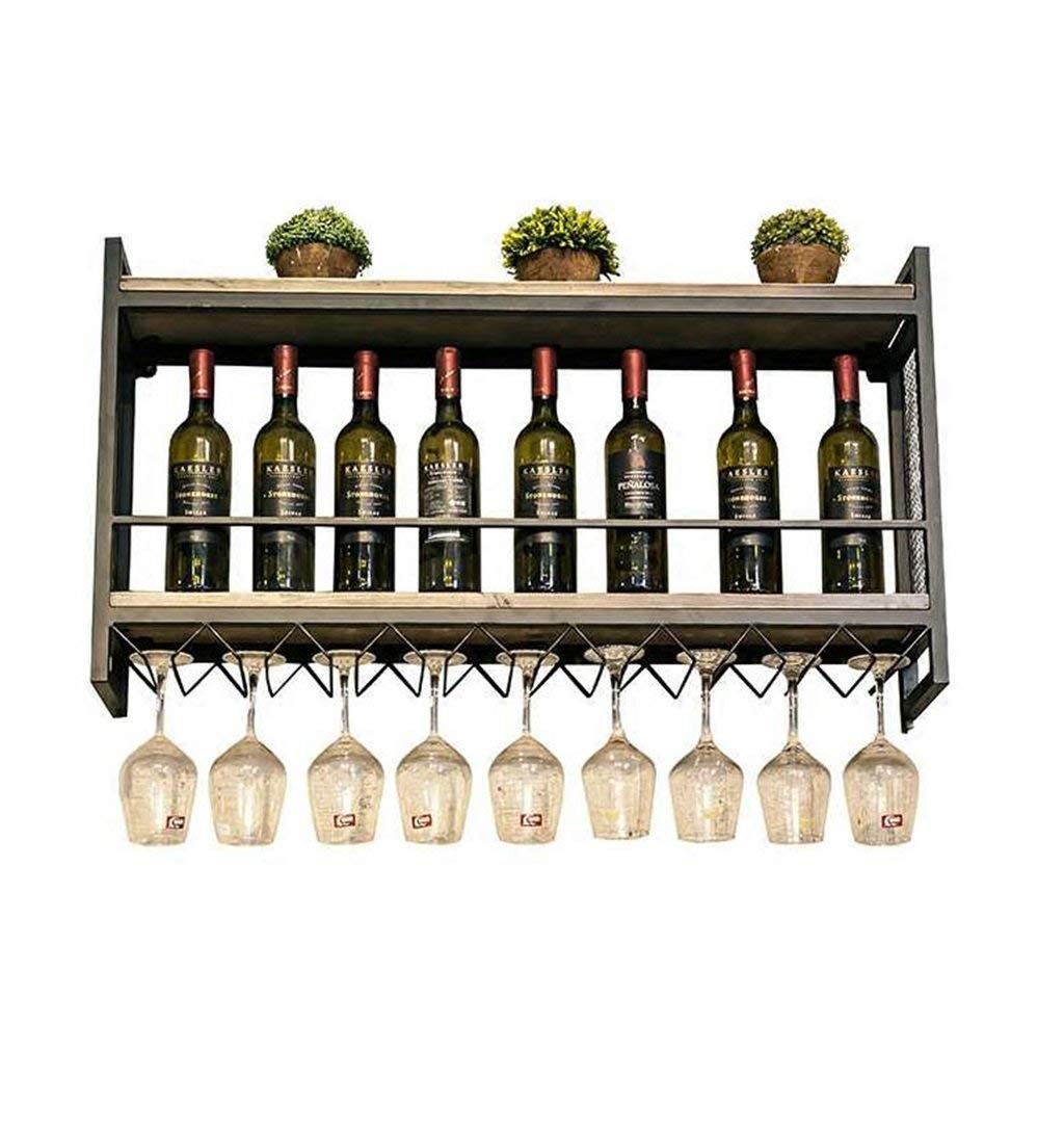 Meuble à vin mural noir vintage pour créer un coin bistrot chaleureux dans votre salon