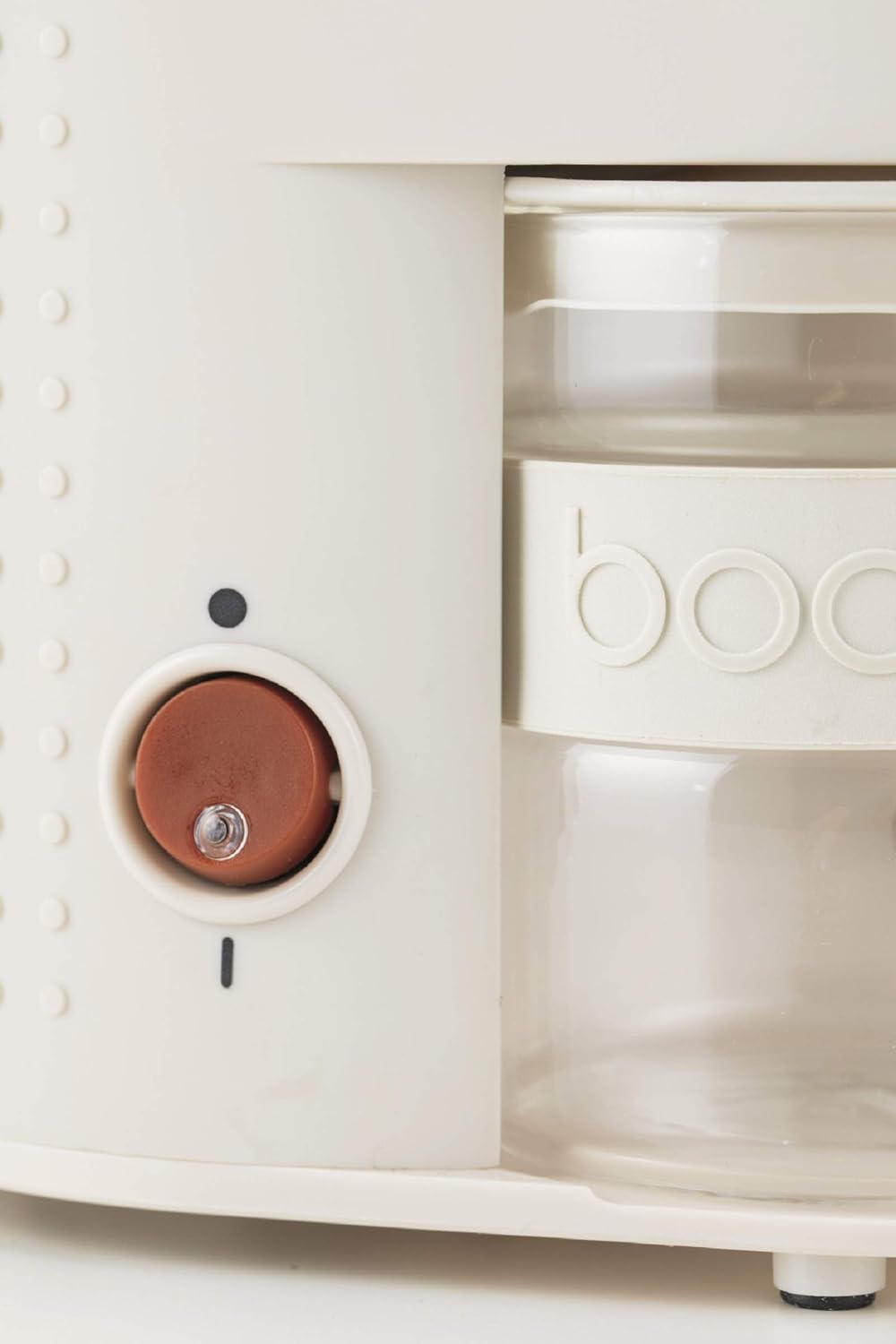 Close-up of the BODUM Bistro Electric Coffee Grinder's power button
