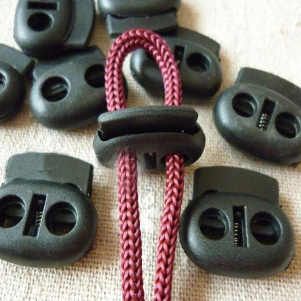 1000pcs Plastic Double Hole Stopper Cord Locks Spring Stopper Fastener Toggles for Drawstring Elastic Lanyard Elastic Locks Bag Accessories for Shoe Drawstrings (Black,18mm)