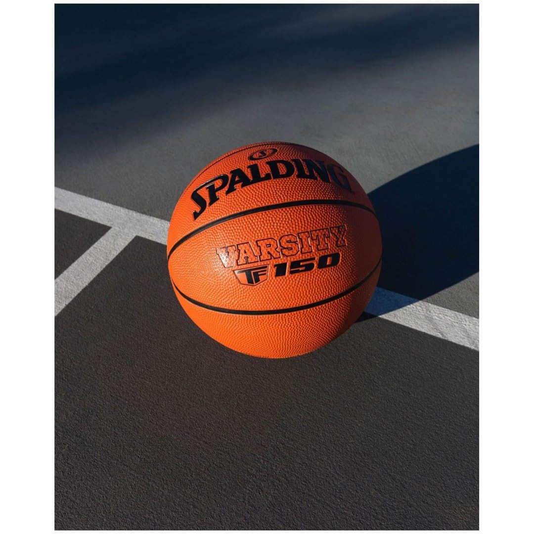 Spalding TF-150 Varsity piłka do koszykówki z wytrzymałej gumy | oficjalny rozmiar | nadaje się do wszystkich powierzchni | z Shooter's Seam dla lepszej kontroli nad piłką