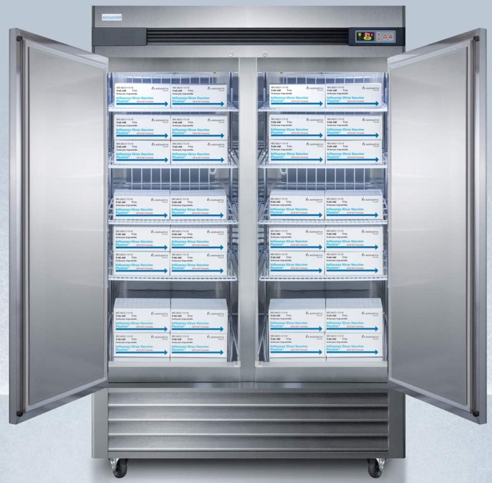 Interior view of the Summit Appliance ARS49ML refrigerator filled with vaccine boxes on its shelves.