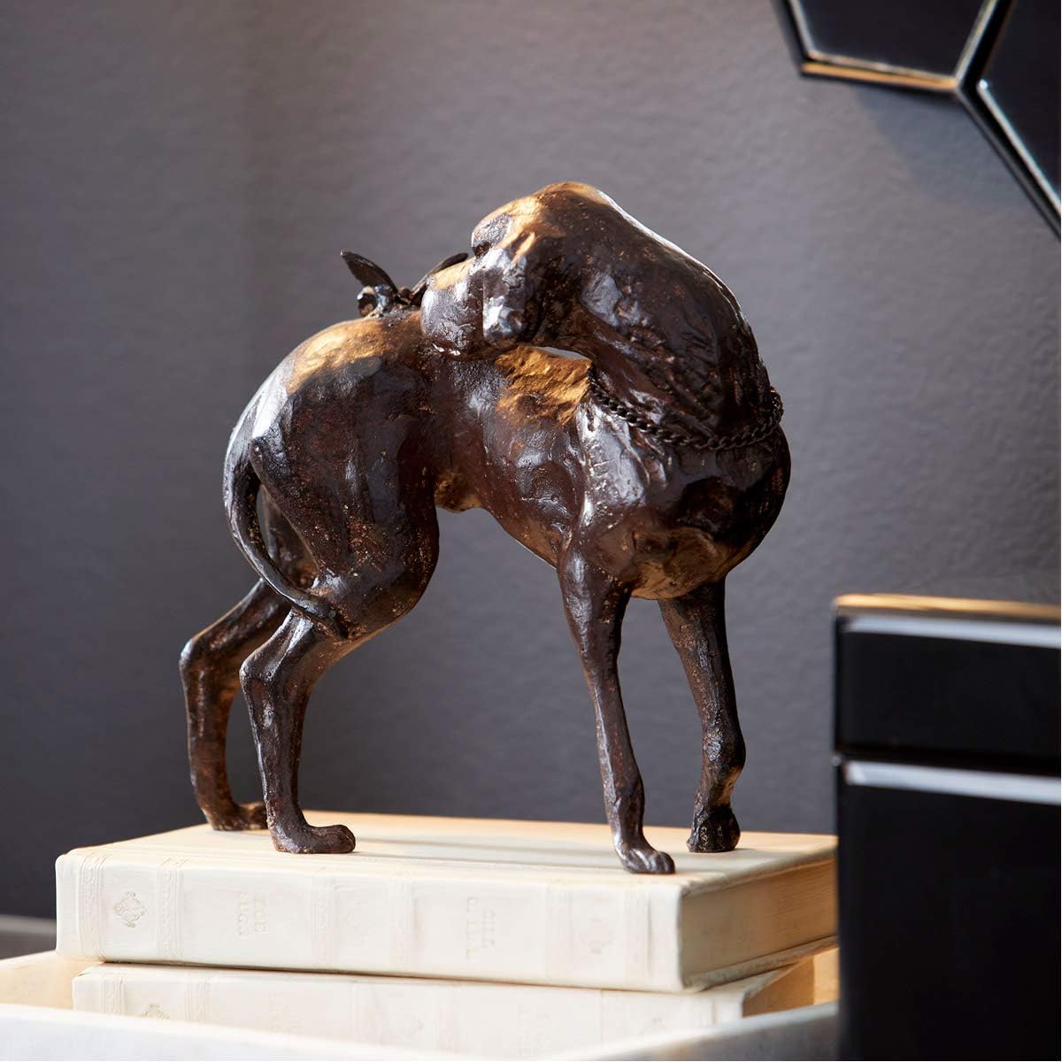Bronze Dog and Butterfly Lodge Sculpture