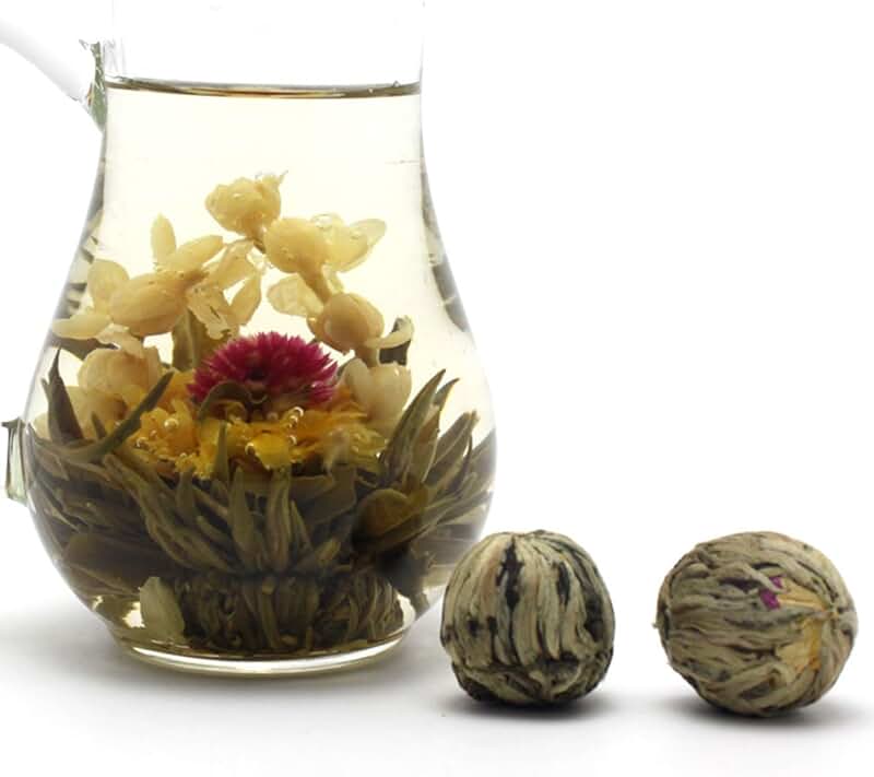 чай в шариках с цветочком. чай в шариках с цветочком. моли юй лун тао (жасминовый персик дракона). китайский цветочный чай. чай в шариках с цветочком.