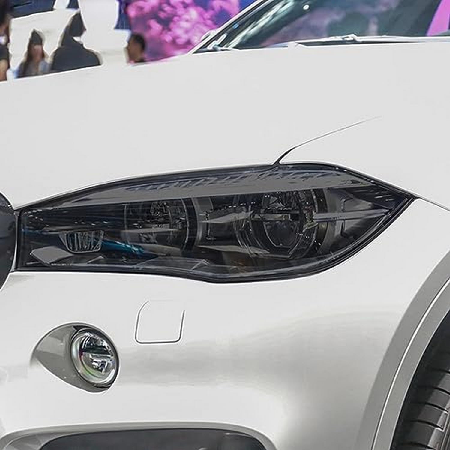 Film phare BMW X6 F16 en TPU premium noir fumé résistant pour une finition esthétique luxe