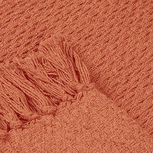 Grande couverture décorative orange à pompons pour sofa