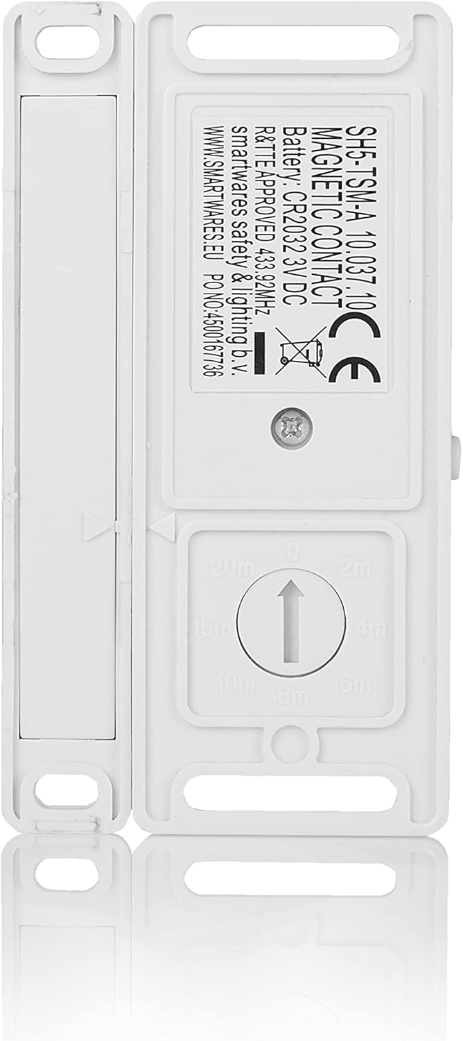 belakang view of Smartwares SH5-TSM-A transmitter showing battery compartment and product label