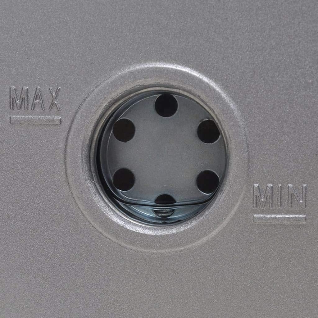Close-up of the oil level sight glass with MIN and MAX markings