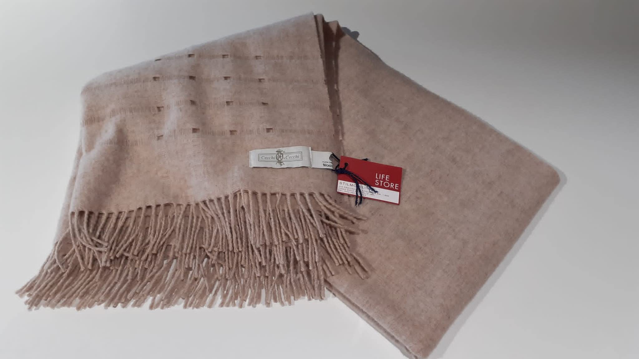 Plaid en pure laine vierge anti-frissons couleur sable pour canapé