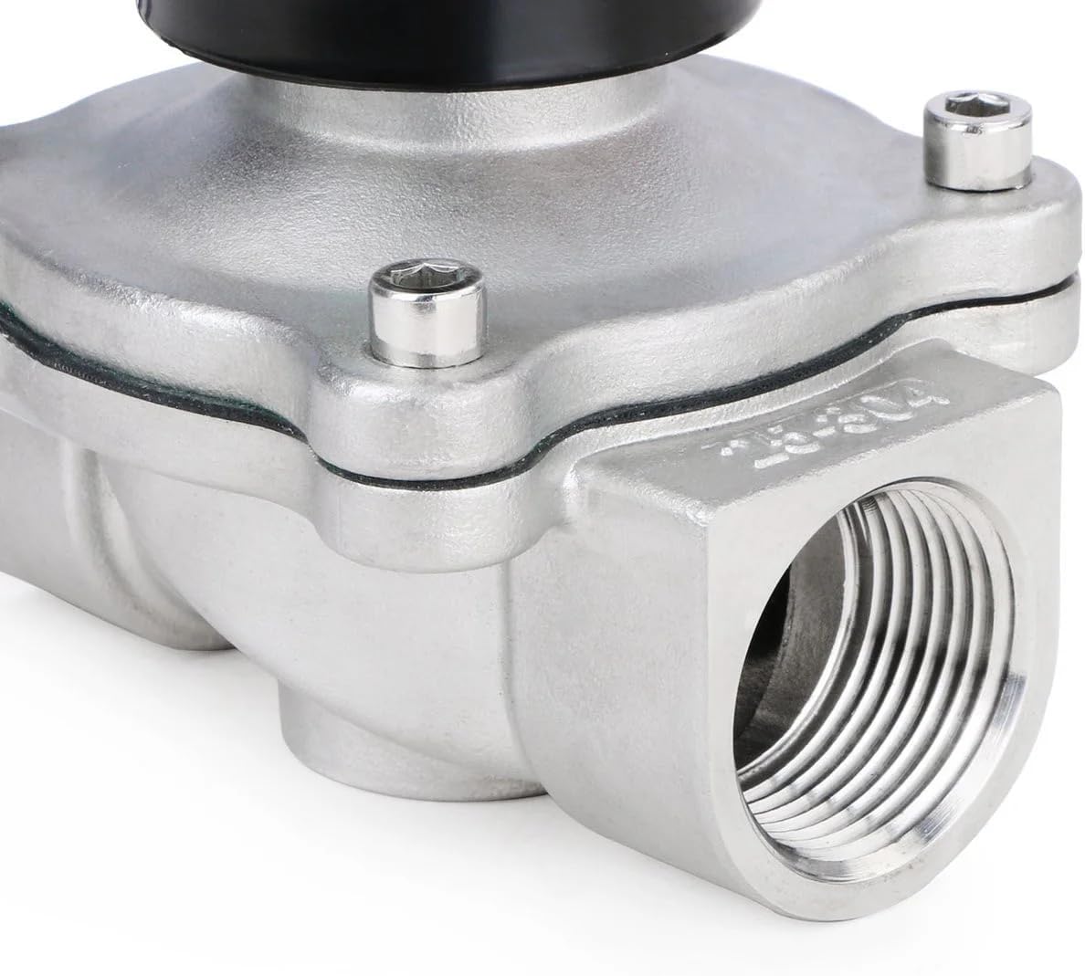 Close-up of the threaded port on the solenoid valve