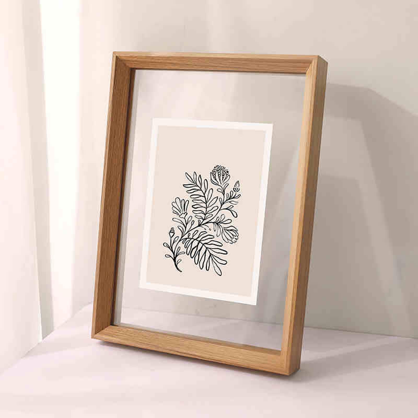 Cadre photo double vitrage flottant pour créer un herbier mural dans votre salon