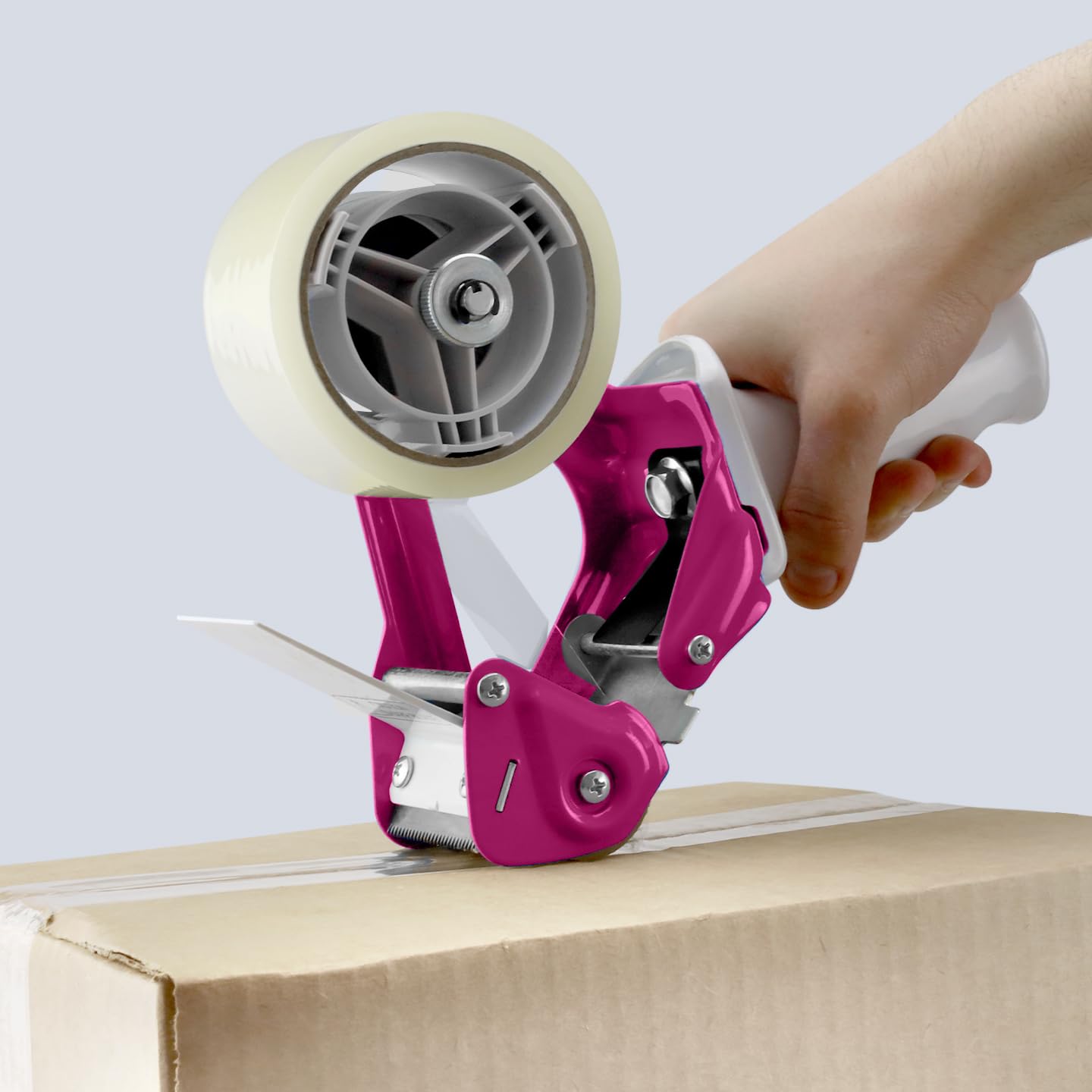 TAPEWELL Dispensador de cinta de embalaje morada con marco de metal resistente, núcleo de 3 pulgadas con mango ergonómico especial, pistola de cinta para cajas de embalaje con hoja de acero templado
