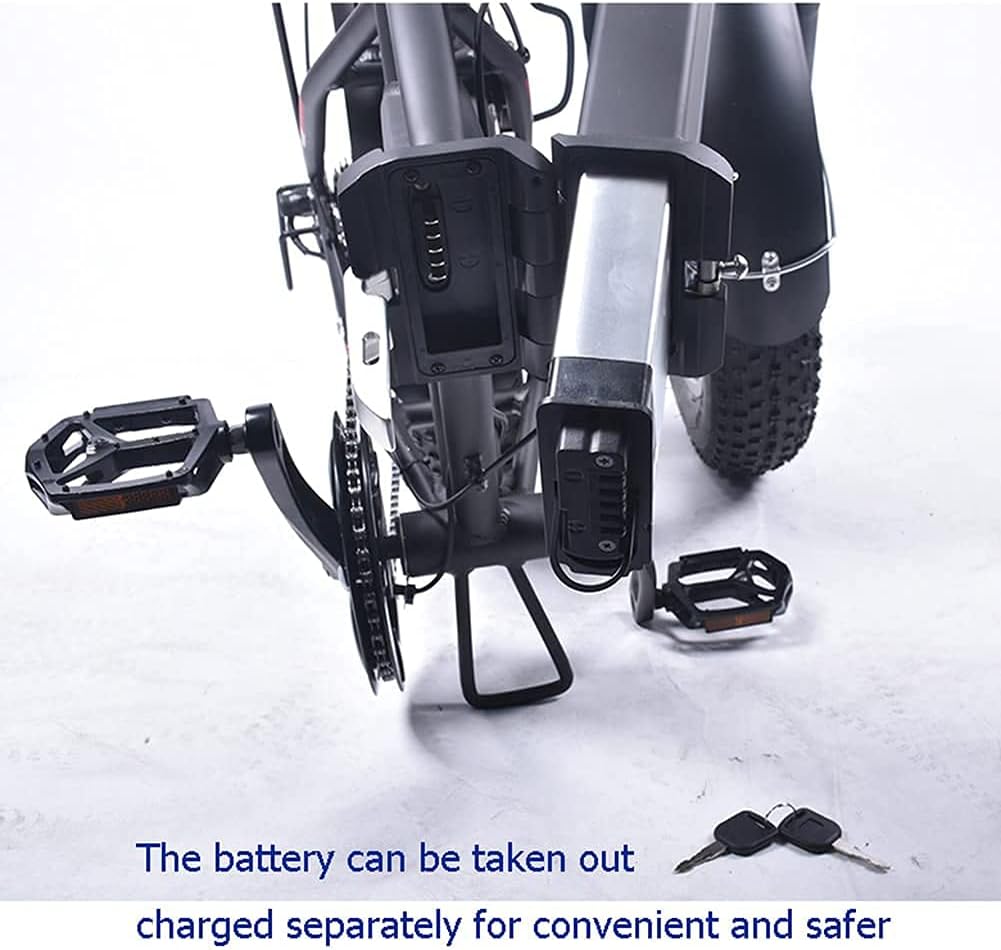 E-bike battery being removed from a folding electric bicycle