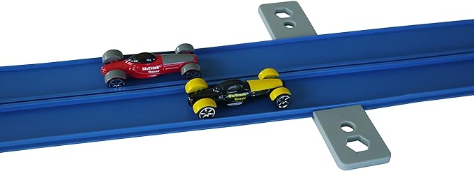One of the unique features of the Blu Track 18 Ft. P.S. Starter set is the inclusion of a Power Storage section, which adds an extra element of fun and challenge to the racing experience. This section can be used to launch toy cars at high speeds and adds an element of competitive play as kids race against each other to see who can send their car the farthest. The set also comes with a variety of accessories and decorations to customize the track and enhance the racing experience.