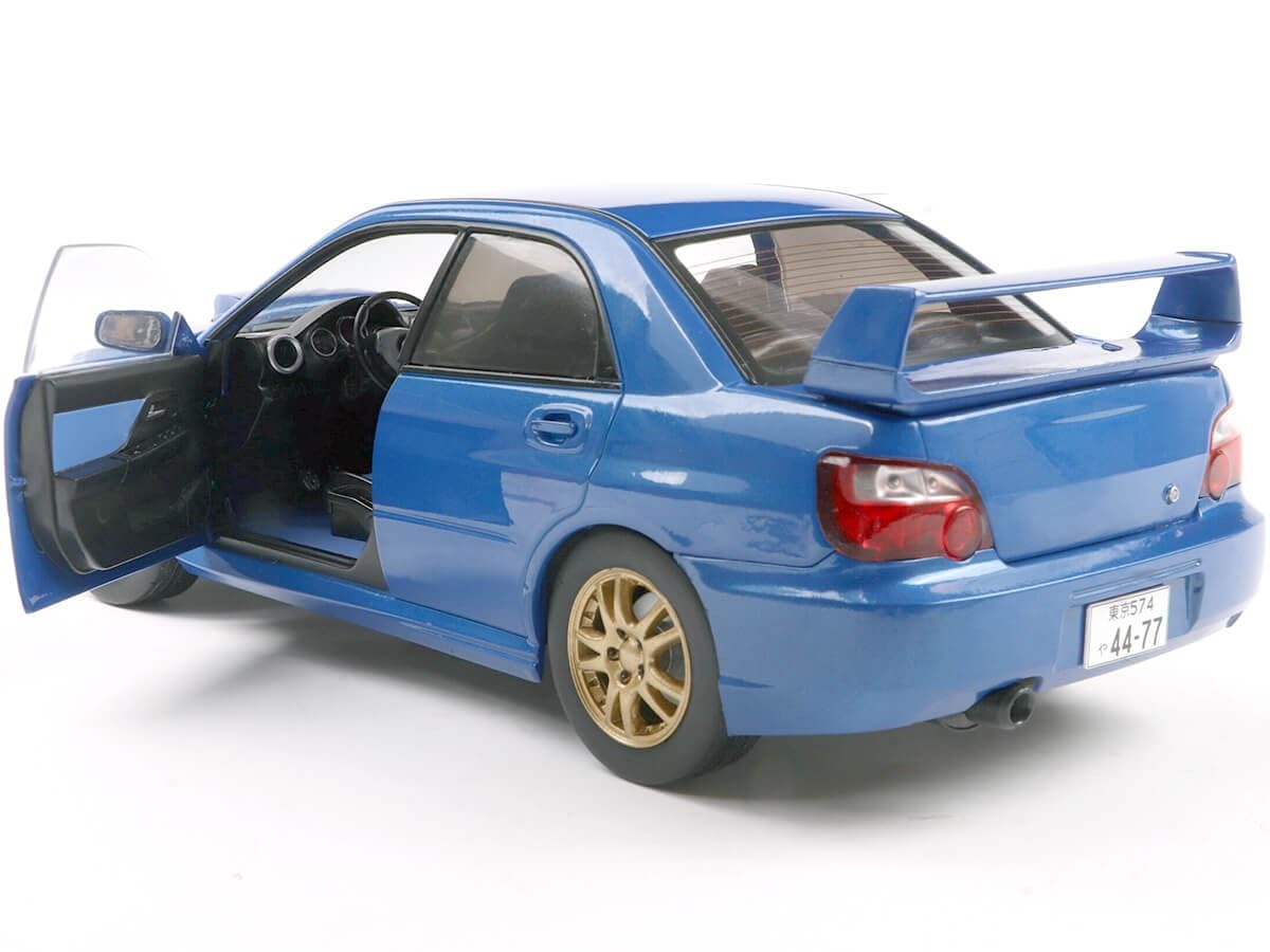スバル インプレッサ WRX STI BLUE 2003 1/18スケール Amazon.com: Subaru Impreza WRX STI 2003 Sonic Blue – 1:18 Diecast