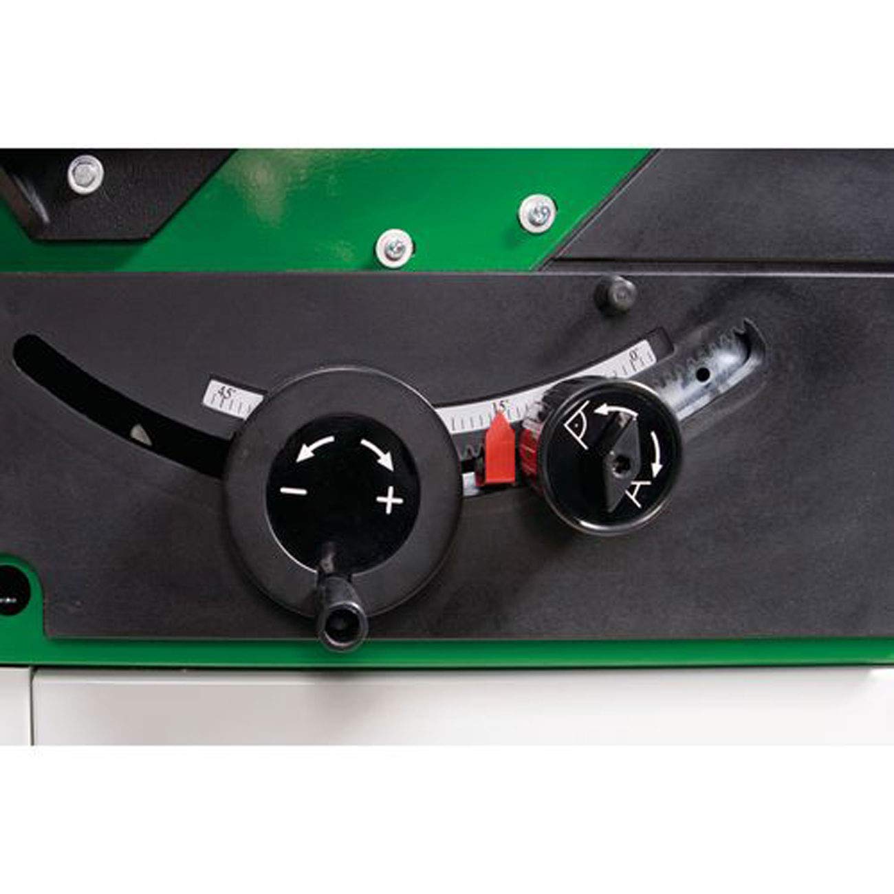 Close-up of the saw's controls, showing the handwheels for blade height and tilt adjustment.