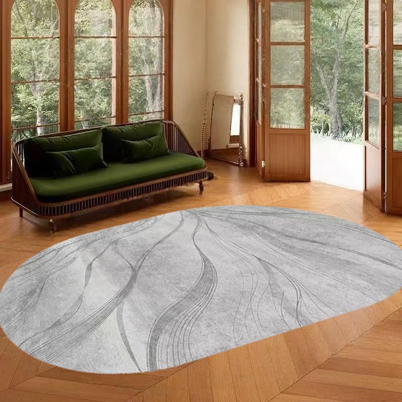 Alfombras ovaladas para sala de estar que suavizan suelos fríos con diseño abstracto gris