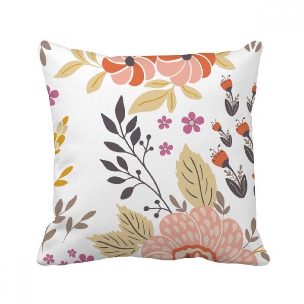 Coussin plante multicolore pour dynamiser l'ambiance cocooning de votre salon