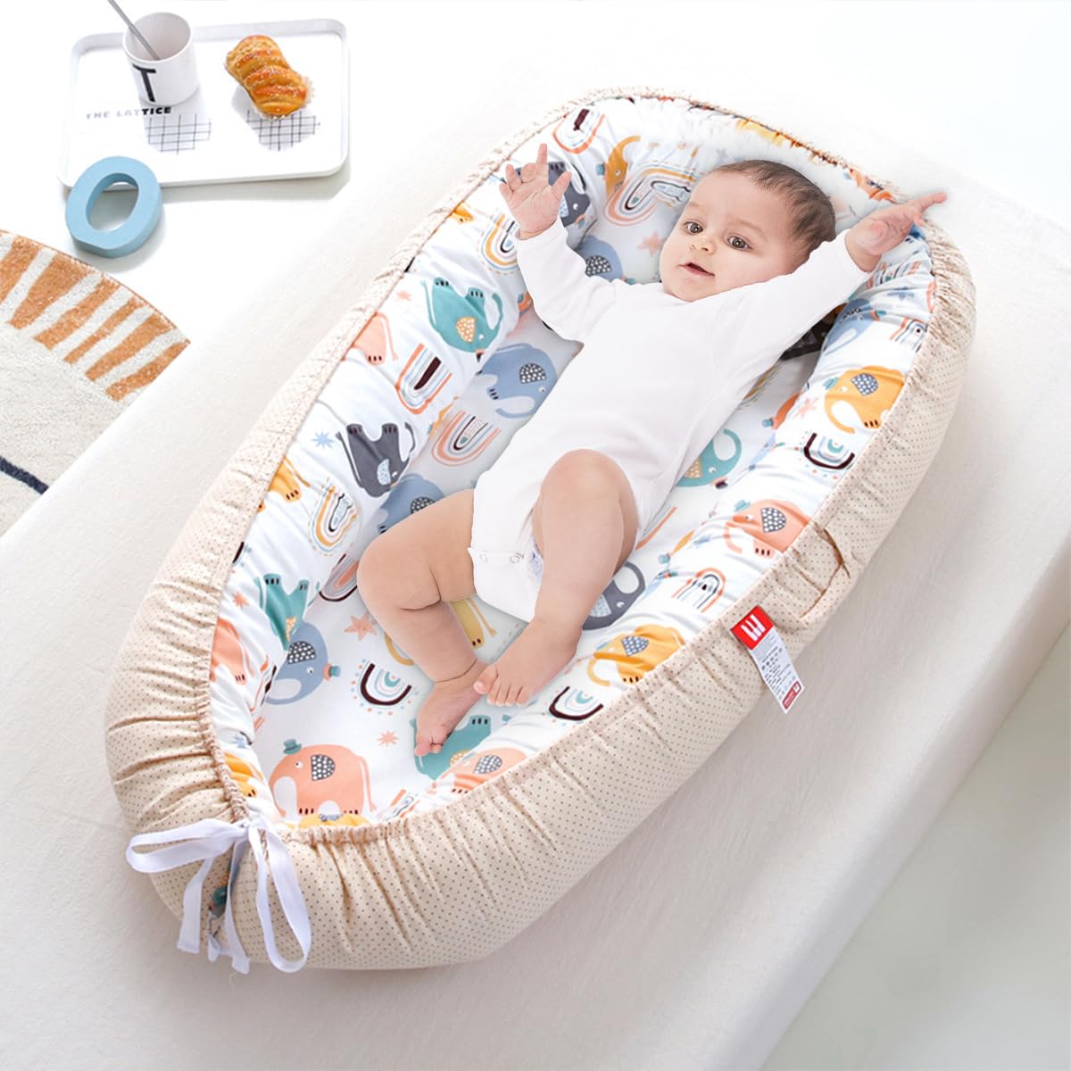 SONARIN Portable Reducteur de Lit Bébé,Nid Bébé Cocoon Nouveau-né Doux Respirant,Couffin de Voyage Nourrisson avec 100% Coton Housse Réversible Lavable,88 x 53 cm(Éléphant Coloré)