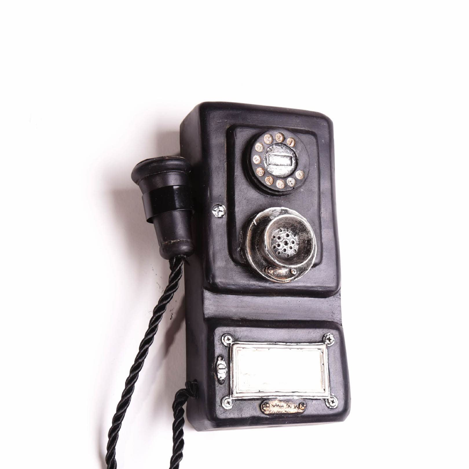 Téléphone rétro mural pour habiller un mur vide avec style antique